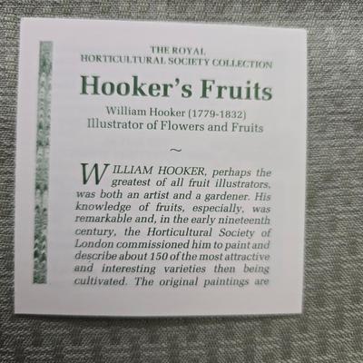 Hooker's Fruits Pimpernel cork backed placemats and matching coasters - Brass candle sticks- a tablecloth and a pottery hotplate