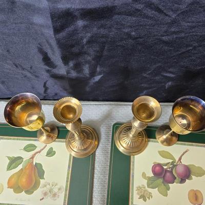 Hooker's Fruits Pimpernel cork backed placemats and matching coasters - Brass candle sticks- a tablecloth and a pottery hotplate