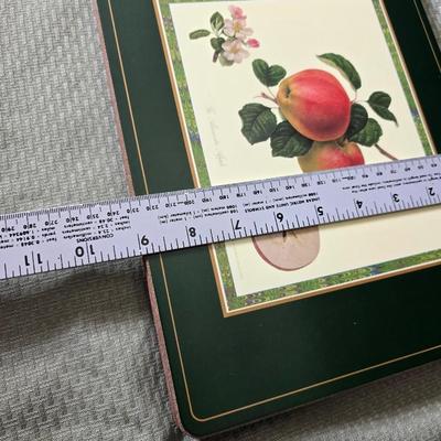 Hooker's Fruits Pimpernel cork backed placemats and matching coasters - Brass candle sticks- a tablecloth and a pottery hotplate