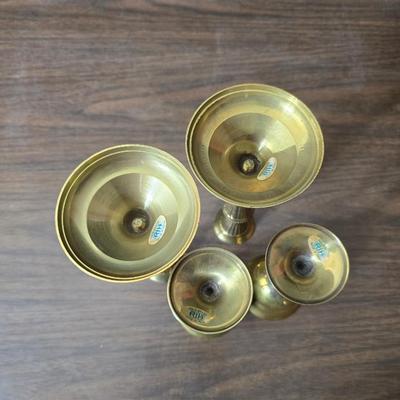 Hooker's Fruits Pimpernel cork backed placemats and matching coasters - Brass candle sticks- a tablecloth and a pottery hotplate