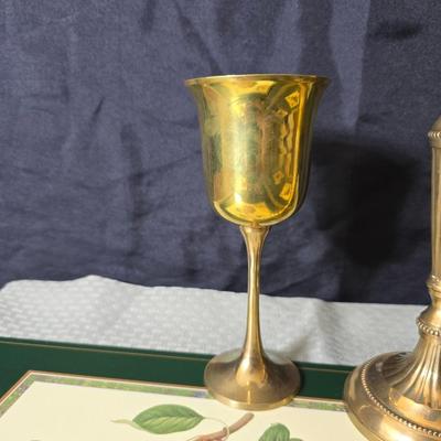 Hooker's Fruits Pimpernel cork backed placemats and matching coasters - Brass candle sticks- a tablecloth and a pottery hotplate