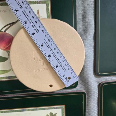 Hooker's Fruits Pimpernel cork backed placemats and matching coasters - Brass candle sticks- a tablecloth and a pottery hotplate