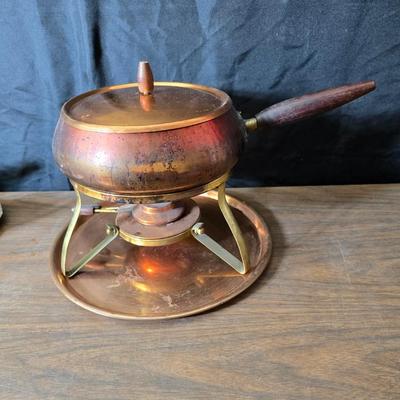 Copper fondu pot with forks a "Le Saucier" copper sauce pot with copper toned tray and mug