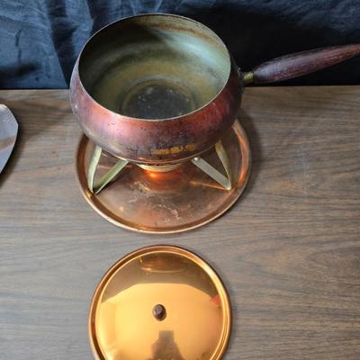 Copper fondu pot with forks a "Le Saucier" copper sauce pot with copper toned tray and mug