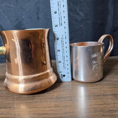 Copper fondu pot with forks a "Le Saucier" copper sauce pot with copper toned tray and mug