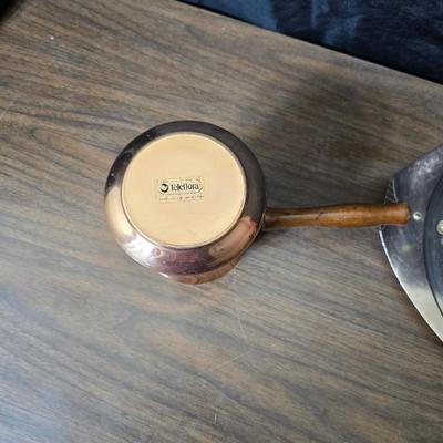 Copper fondu pot with forks a "Le Saucier" copper sauce pot with copper toned tray and mug