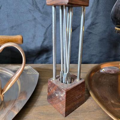 Copper fondu pot with forks a "Le Saucier" copper sauce pot with copper toned tray and mug