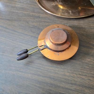 Copper fondu pot with forks a "Le Saucier" copper sauce pot with copper toned tray and mug