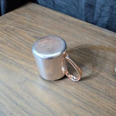 Copper fondu pot with forks a "Le Saucier" copper sauce pot with copper toned tray and mug
