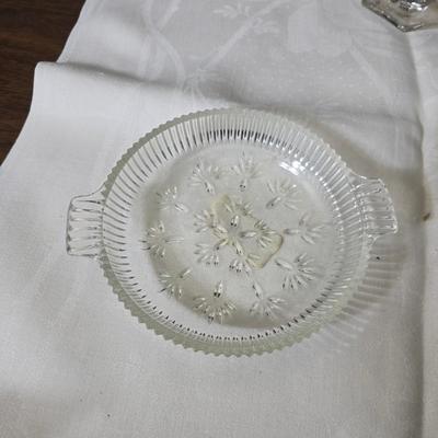 Pressed glass collection of bowls, platters, and candlesticks