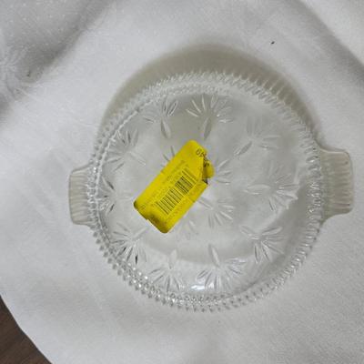 Pressed glass collection of bowls, platters, and candlesticks