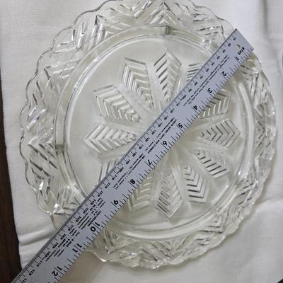 Pressed glass collection of bowls, platters, and candlesticks