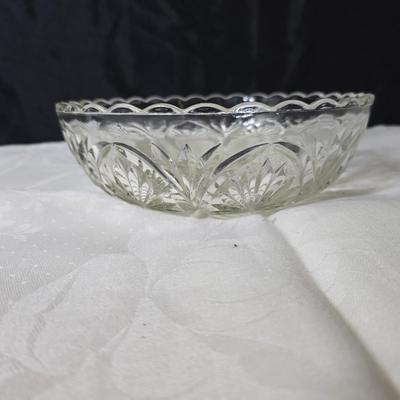 Pressed glass collection of bowls, platters, and candlesticks
