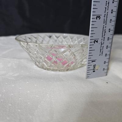 Pressed glass collection of bowls, platters, and candlesticks