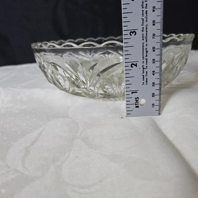 Pressed glass collection of bowls, platters, and candlesticks
