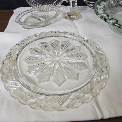 Pressed glass collection of bowls, platters, and candlesticks