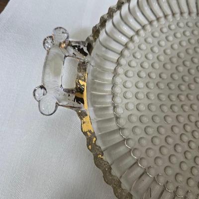 Pressed glass collection of bowls, platters, and candlesticks