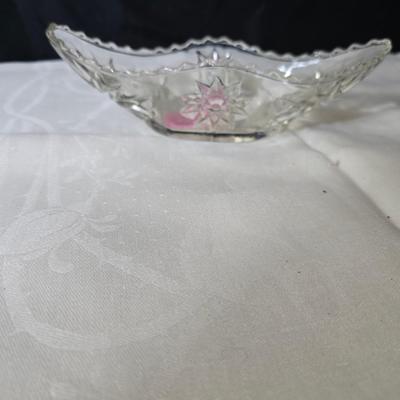 Pressed glass collection of bowls, platters, and candlesticks