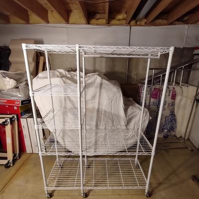 METAL GARMENT RACK ON CASTERS