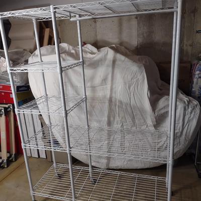 METAL GARMENT RACK ON CASTERS