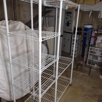 METAL GARMENT RACK ON CASTERS