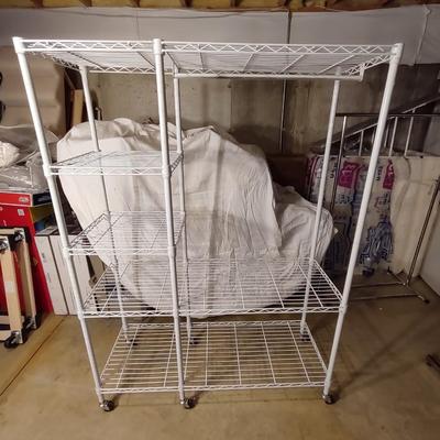 METAL GARMENT RACK ON CASTERS