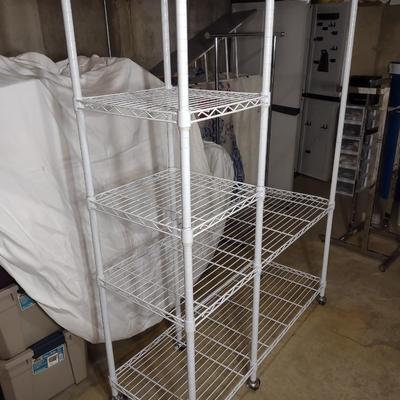 METAL GARMENT RACK ON CASTERS