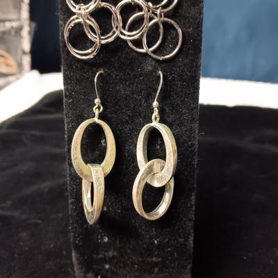 SILVER TONE DANGLE EARRINGS AND BRACELET