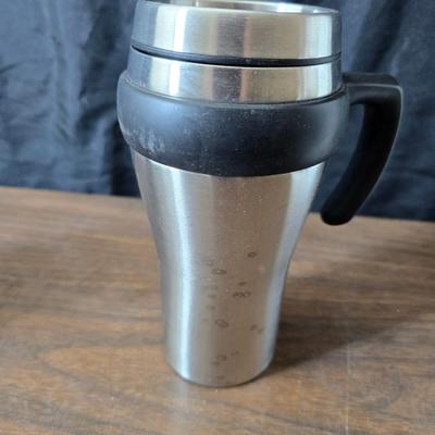 Sunbeam coffee maker with a selection of coffee mugs