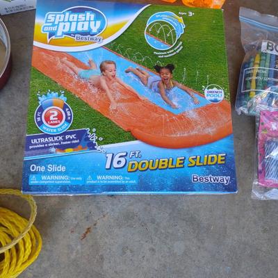 SPLASH AND PLAY SLIDE, BUBBLES, FRUIT ROLL-UPS AND LEASH