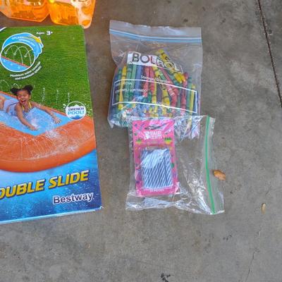 SPLASH AND PLAY SLIDE, BUBBLES, FRUIT ROLL-UPS AND LEASH