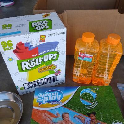 SPLASH AND PLAY SLIDE, BUBBLES, FRUIT ROLL-UPS AND LEASH