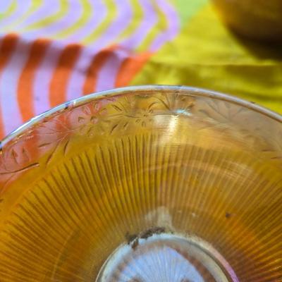 Fire king orange lusterware with a fun & funky vintage tablecloth