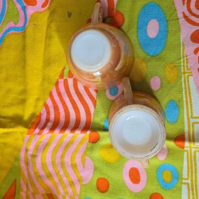 Fire king orange lusterware with a fun & funky vintage tablecloth