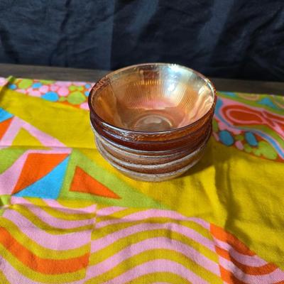 Fire king orange lusterware with a fun & funky vintage tablecloth