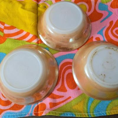 Fire king orange lusterware with a fun & funky vintage tablecloth