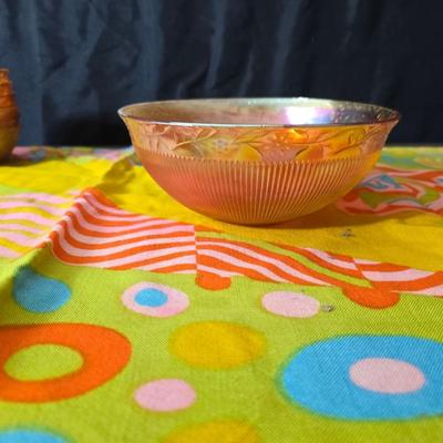 Fire king orange lusterware with a fun & funky vintage tablecloth