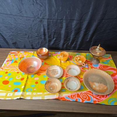 Fire king orange lusterware with a fun & funky vintage tablecloth