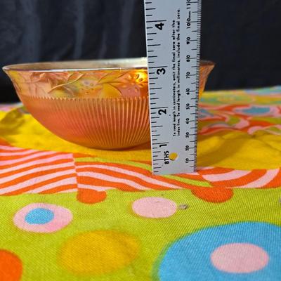 Fire king orange lusterware with a fun & funky vintage tablecloth