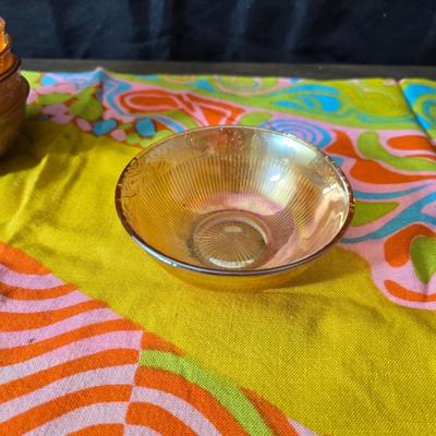 Fire king orange lusterware with a fun & funky vintage tablecloth