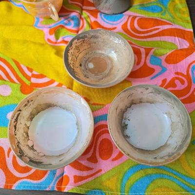 Fire king orange lusterware with a fun & funky vintage tablecloth