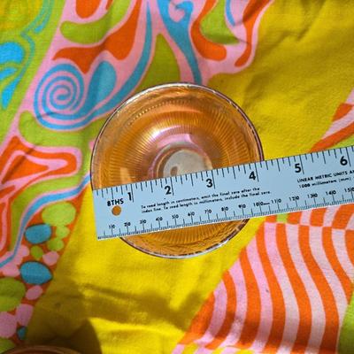 Fire king orange lusterware with a fun & funky vintage tablecloth