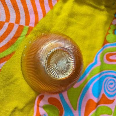 Fire king orange lusterware with a fun & funky vintage tablecloth