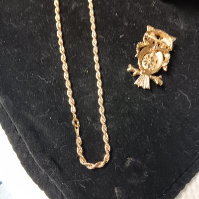 2 GOLD TONE NECKLACES AND AN OWL BROOCH
