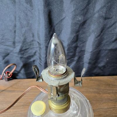 Small vintage oil lamp with electric cork adapter