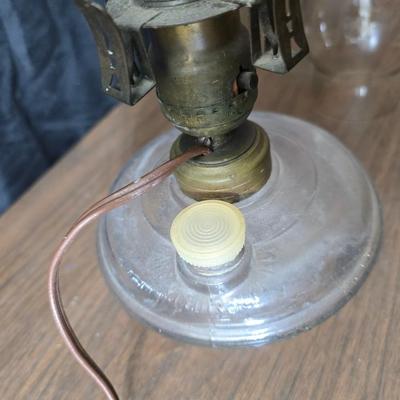 Small vintage oil lamp with electric cork adapter