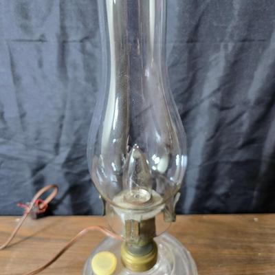 Small vintage oil lamp with electric cork adapter