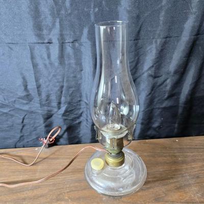 Small vintage oil lamp with electric cork adapter