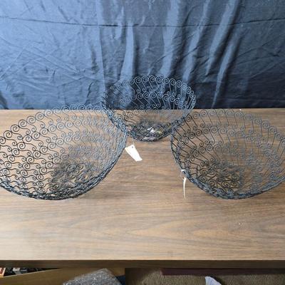 Three metal mesh decorative baskets