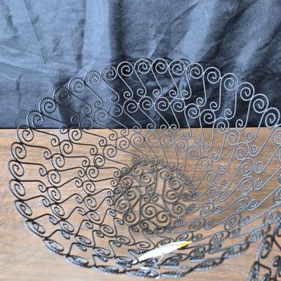 Three metal mesh decorative baskets